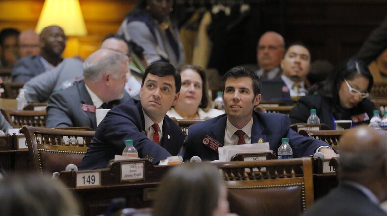 Mar. 3 2017 - Atlanta - UPDATED CAPTION - BILL PASSED AFTER RECONSIDERATION - House members watch the vote on HB 196. Lawmakers ruled against House Bill 196 by a vote of 56-105. House Bill 196 would have made a musician’s taxable income equal to the amount paid as compensation for the licensing or other authorized use or reproduction.Following its defeat, state Rep. Matt Dollar, R-Marietta, requested the bill be sent back to the Rules Committee to be reconsidered, which was approved by a 126-37 vote. Later in the evening HB 196 passed 97-65. Crossover day on the 28th legislative day of the 2017 Georgia General Assembly. BOB ANDRES /BANDRES@AJC.COM