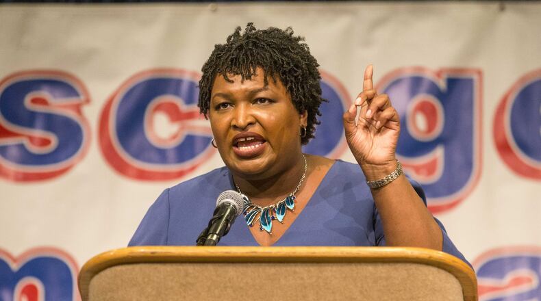 09/18/2018 — Columbus, Georgia — Democratic gubernatorial candidate Stacey Abrams speaks during the 2018 Muscogee County Democratic Gala in Columbus, Tuesday, September 18, 2018. (ALYSSA POINTER/ALYSSA.POINTER@AJC.COM)