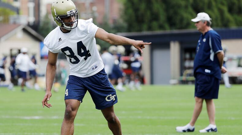 Georgia Tech's Stephen Dolphus prepares to run a play during an NCAA college spring football practice in Atlanta, Monday, March 27, 2017. (AP Photo/David Goldman)