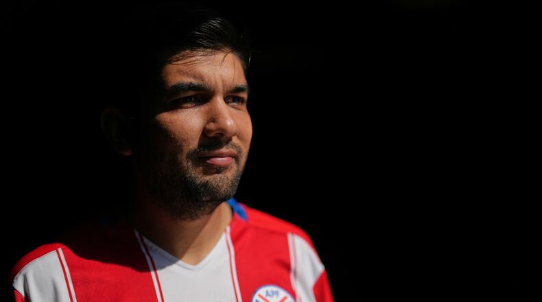Rodrigo Valdez wears a team Paraguay soccer jersey as he poses for a picture Friday, June 5, 2026, in San Diego. (AP Photo/Gregory Bull)
