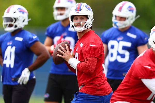 Buffalo Bills quarterback Josh Allen looks to pass the ball during NFL football practice in Orchard Park, N.Y., Tuesday May 27, 2025. (AP Photo/Jeffrey T. Barnes)
