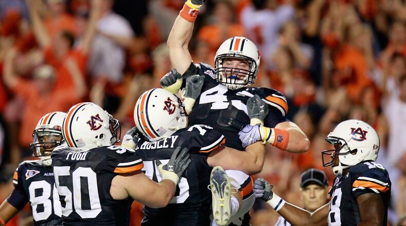 Philip Lutzenkirchen, No. 43, of course, pictured here in a moment of celebration at Auburn,  died in a single car accident in the summer of 2014. (Kevin C. Cox/Getty Images)