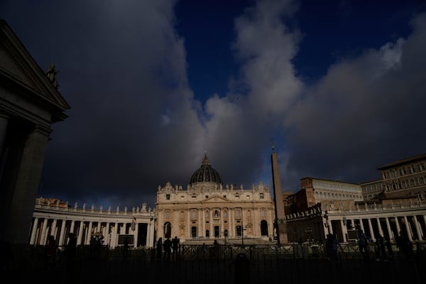 Clouds pass over the St. Peter Basilica at the Vatican, Tuesday, May 6, 2025. (AP Photo/Gregorio Borgia)
