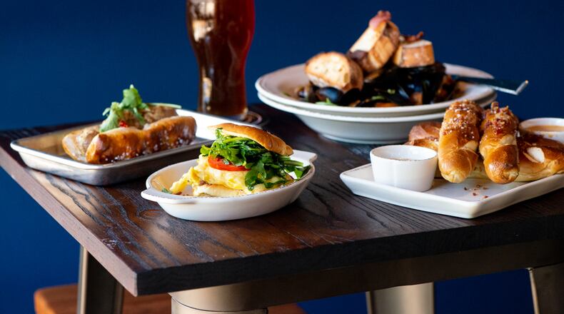 Lost Druid The Awakening Breakfast Sandwich, The Dark Wurst, Drunken Mussels, and Tavern Pretzels.