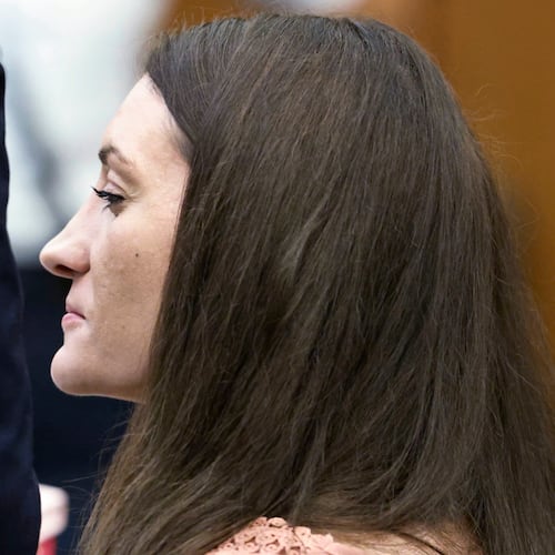 Lindsay Clancy grins after her attorney Kevin Reddington concluded his cross examination of rebuttal witness Dr. Avram Mack during her murder trial at Plymouth Superior Court, Monday, Aug. 24, 2026 in Plymouth, Mass. (Greg Derr/The Patriot Ledger via AP, Pool)