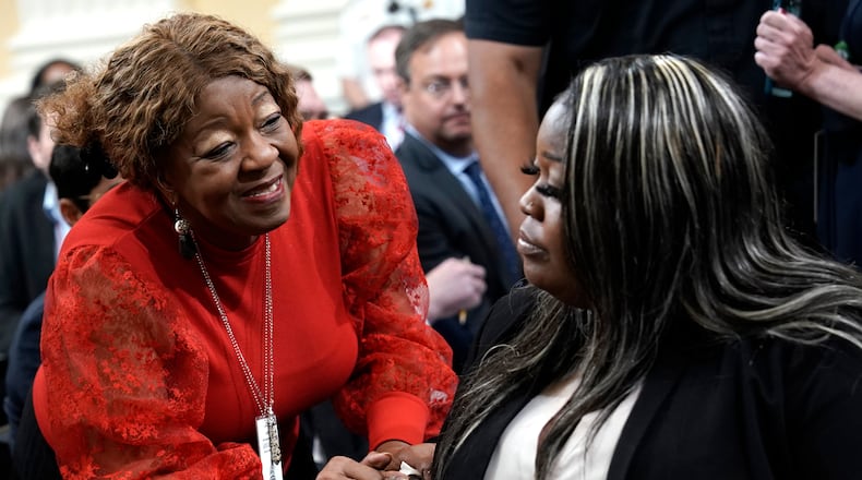 Former Fulton County election worker Ruby Freeman, left, talks to her daughter Wandrea"Shaye" Moss, a former Georgia election worker, after Moss testified before a U.S. House select committee during its fourth hearing on its investigation into the attack on the U.S. Capitol on Jan. 6, 2021. The State Election Board on Tuesday formally dismissed a complaint that Freeman and Moss had participated in election fraud while counting ballots during the 2020 presidential election. (Yuri Gripas/Abaca Press/TNS)