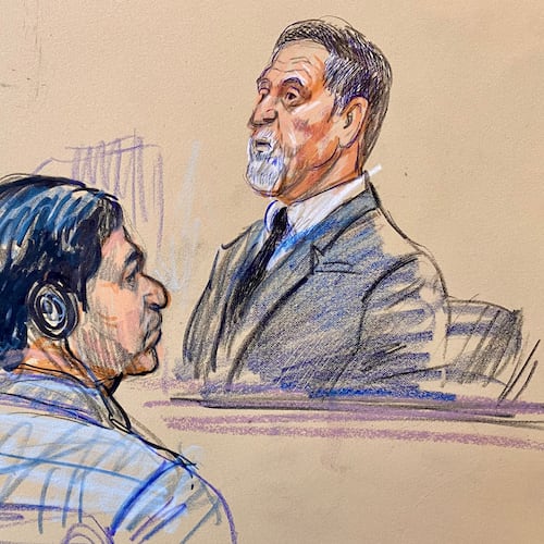 This courtroom sketch depicts government witness Bruce Hoffman testifying as defendant Mohammad Sharifullah, seated left, listens during the opening day of the trial for Sharifullah in federal court in Alexandria, Va., Monday, April 20, 2026. (Dana Verkouteren via AP)