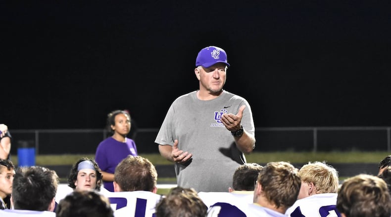 Former Union County coach Brian Allison talks with his team after a spring game at Chestatee.
