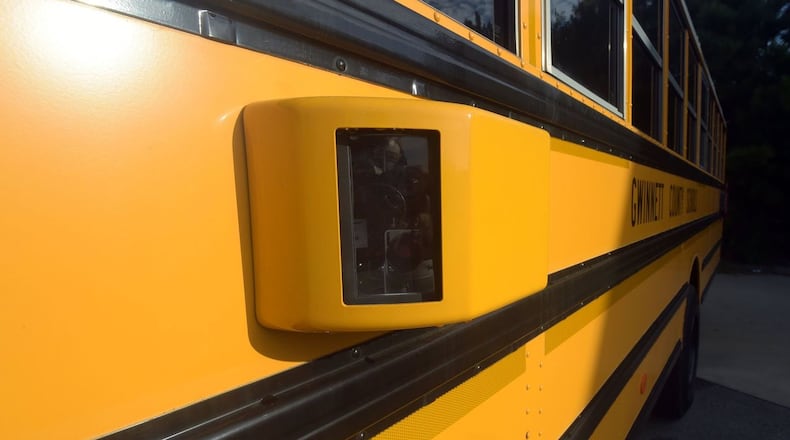 Gwinnett County is using cameras like this to catch motorists who pass school buses when they stop to pick up or drop off students. KENT JOHNSON / AJC.COM