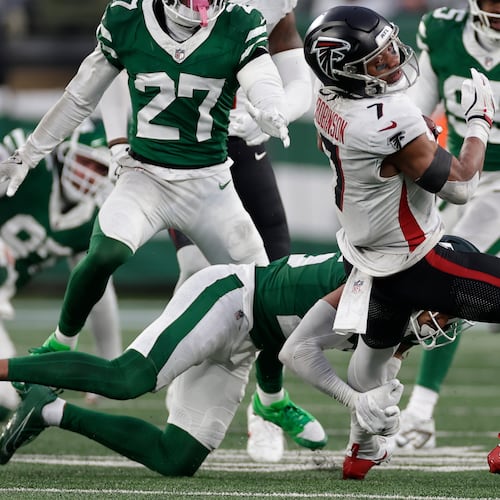 Atlanta Falcons running back Bijan Robinson (7) runs against the New York Jets during the second half of an NFL football game, Sunday, Nov. 30, 2025, in East Rutherford, N.J. (AP Photo/Adam Hunger)