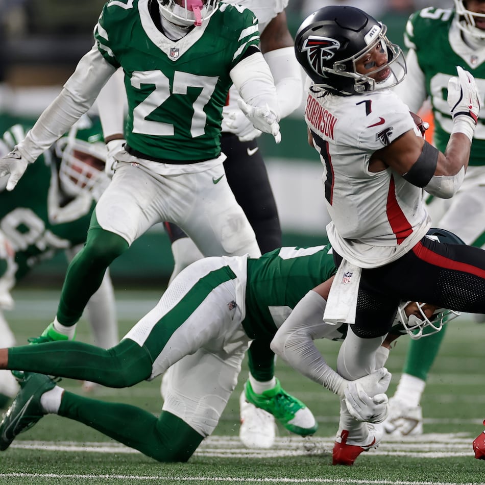 Atlanta Falcons running back Bijan Robinson was one of the few bright spots for the Falcons in a 27-24 loss to the Jets, running for 142 yards and catching five passes for another 51. (Adam Hunger/AP)