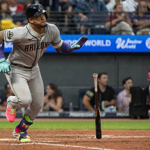 Arizona Diamondbacks' Ketel Marte watches his double off Cleveland Guardians starting pitcher Parker Messick during the fourth inning of a baseball game, Saturday, Aug. 1, 2026, in Cleveland. (AP Photo/Phil Long)