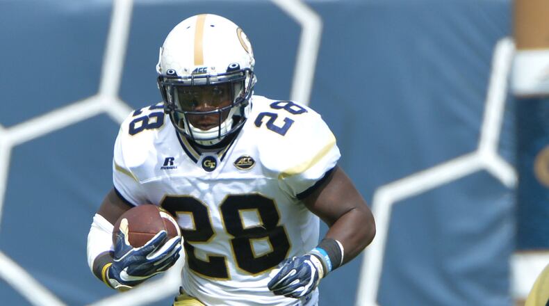 October 15, 2016 Atlanta - Georgia Tech running back J.J. Green (28) runs against Georgia Southern defensive back Sean Freeman (24) in the first half at Bobby Dodd Stadium on Saturday, October 15, 2016. HYOSUB SHIN / HSHIN@AJC.COM
