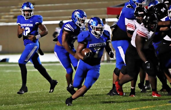 Stephenson running back Jayden Johnson rushes the ball Mount Zion in 2024. (Courtesy of DeKalb County School District Athletics)