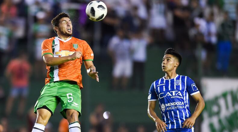 Eric Remedi of Banfield heads the ball against Guillermo Fernández of Godoy Cruz during a match between Banfield and Godoy Cruz as part of Argentina Superliga 2017/18 at Florencio Sola Stadium on April 21, 2018 in Buenos Aires, Argentina. (Photo by Marcelo Endelli/Getty Images)