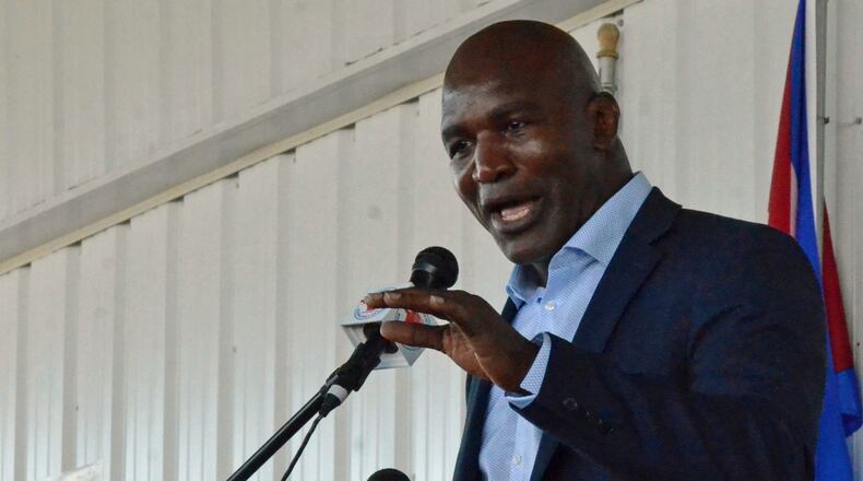 Evander Holyfield gives his speech at the International Boxing Hall of Fame's induction ceremony in Canastota, N.Y., Sunday, June 11, 2017. (Kyle Mennig/Oneida Daily Dispatch via AP)