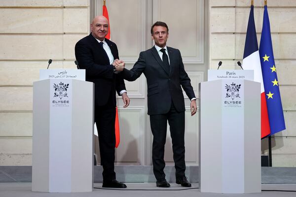 French President Emmanuel Macron, right, and Lebanese President Joseph Aoun shake hands after a joint press conference at the Elysee Palace in Paris, Friday, March 28, 2025. (Sarah Meyssonnier/Pool via AP)