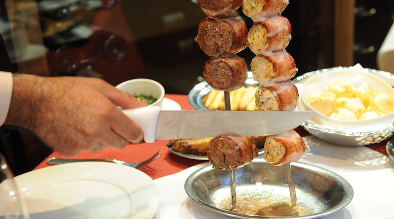 Bacon-wrapped filet mignon and chicken breast at Chama Gaucha in Buckhead. Contributed by Chama Gaucha