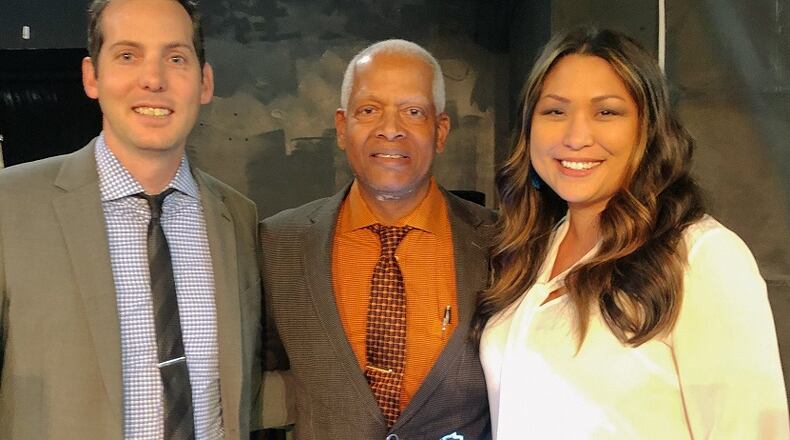 Loria Crews (right) accepted her Beacon of Light award on Jan. 12 from Congressman Hank Johnson (center) with her husband Chris Crews in attendance. COURTESY OF GWINNETT COUNTY PUBLIC SCHOOLS