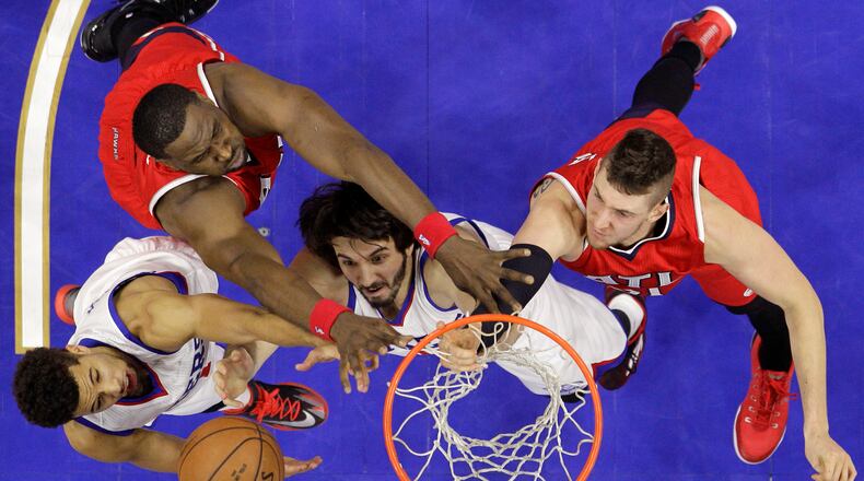 Philadelphia 76ers' Furkan Aldemir, center, of Turkey, and Michael Carter-Williams, left, battle for a rebound against Atlanta Hawks' Mike Muscala, right, and Elton Brand during the second half of an NBA basketball game, Tuesday, Jan. 13, 2015, in Philadelphia. Atlanta won 105-87. (AP Photo/Matt Slocum) Philadelphia 76ers' Furkan Aldemir, center, of Turkey, and Michael Carter-Williams, left, battle for a rebound against Atlanta Hawks' Mike Muscala, right, and Elton Brand during the second half of an NBA basketball game earlier this month. Atlanta won 105-87. AP/Matt Slocum