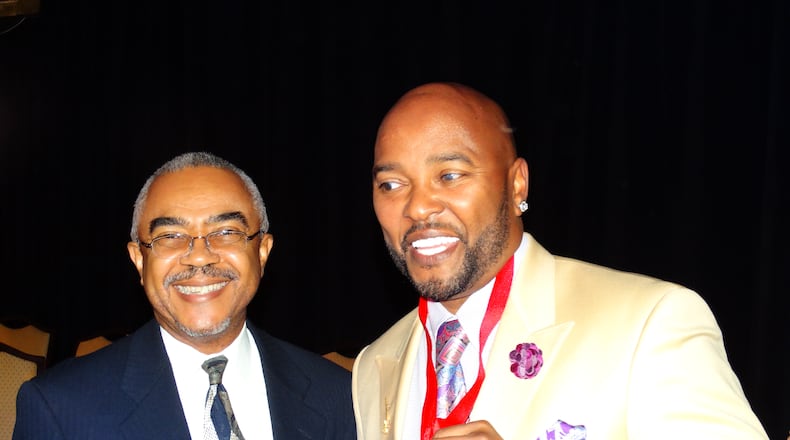 Current V-103 morning host Ryan Cameron, a new inductee into the Georgia Radio Hall of Fame, with former V-103 morning host Mike Roberts, who was inducted in 2013. CREDIT: Rodney Ho/rho@ajc.com