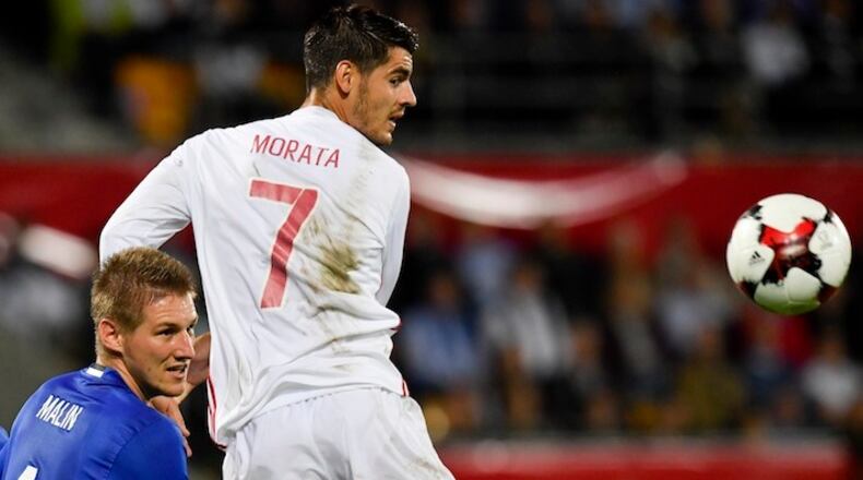 Liechtenstein's Martin Rechsteiner, left, fights for the ball with Spain's Alvaro Morata, during the 2018 Fifa World Cup Russia group G qualification soccer match between Liechtenstein and Spain at the Rheinpark stadium in Vaduz, Liechtenstein, on Tuesday, September 05, 2017. (KEYSTONE/Gian Ehrenzeller)