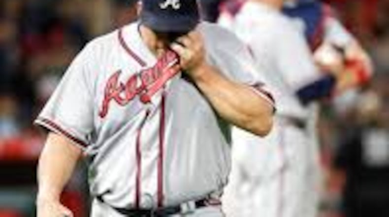 Bartolo Colon trudges off the field during a nine-run third inning Tuesday, when the Braves made three errors and other defensive mistakes and added seven unearned runs allowed to their majors-leading total. (AP photo)
