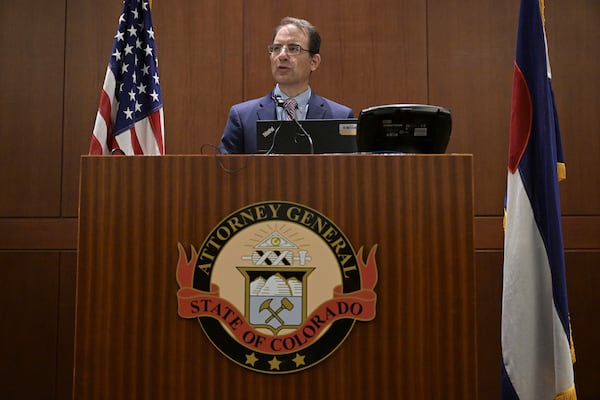 Colorado Attorney General Phil Weiser announces that a Mesa County, Colo., sheriff's deputy violated state law when he shared information with federal officials that led to a Utah college student's immigration arrest during a news conference Tuesday, July 22, 2025, in Denver. (Hyoung Chang/The Denver Post via AP)