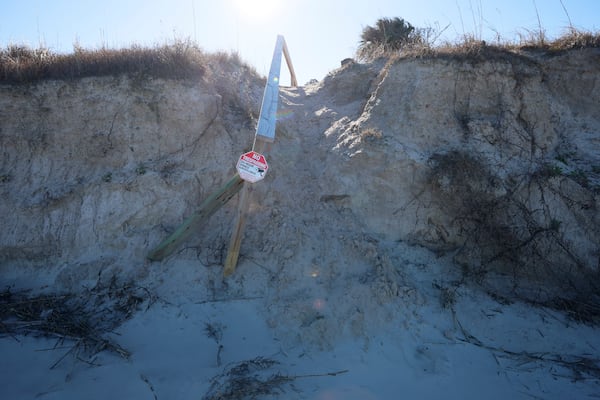 Heavy damage to the dunes on the north side of Tybee Island has led to the closure of public access points. (Miguel Martinez/AJC)