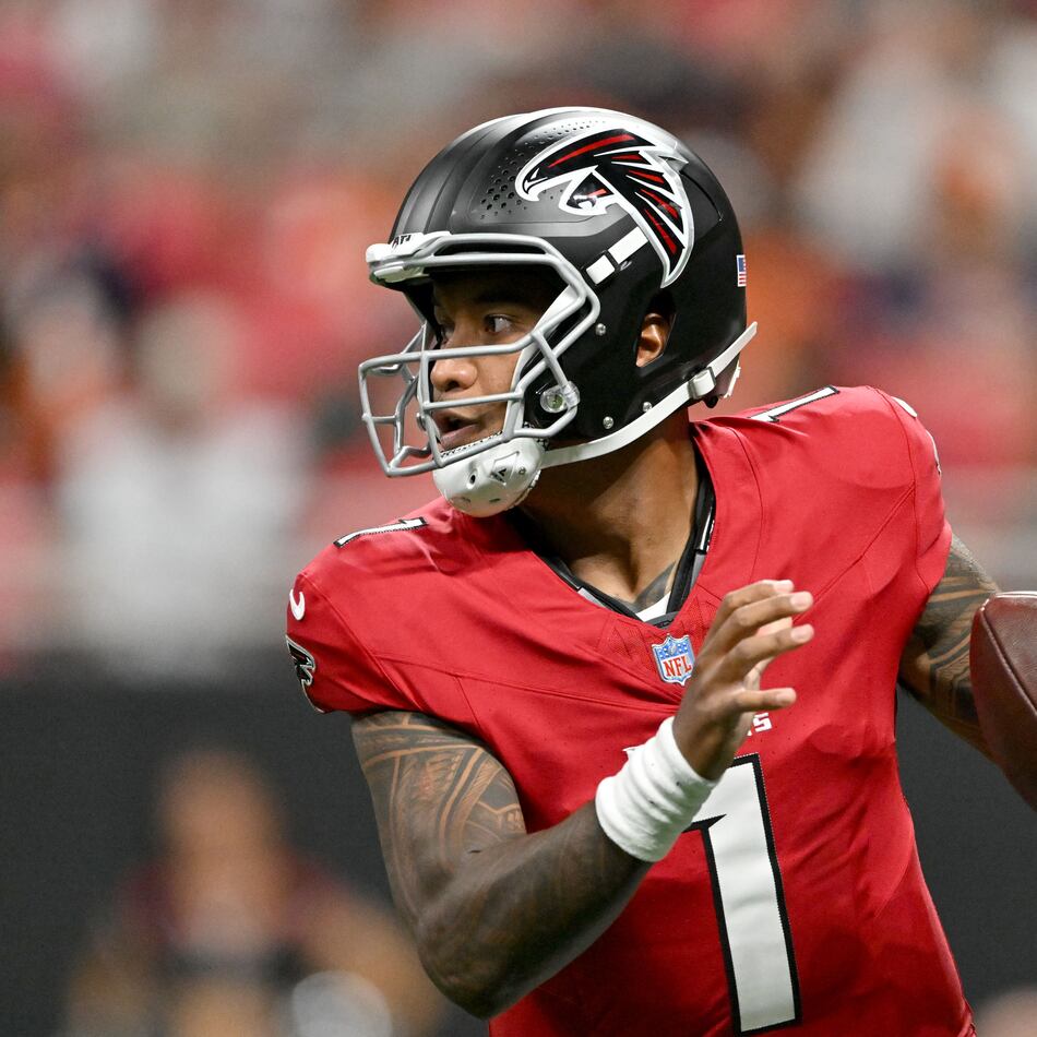 Falcons quarterback Tua Tagovailoa — pictured looking to pass against the Broncos in a preseason game Friday, Aug. 14, 2026 — was named Atlanta's starting quarterback after signing with the team in March. (Hyosub Shin/AJC)