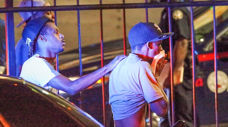 “A lot of people” were inside the the Blue Ivory Restaurant and Lounge when a man was shot and killed early Wed., July 1, 2015. JOHN SPINK / JSPINK@AJC.COM