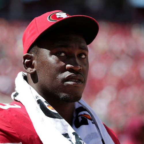 FILE - San Francisco 49ers linebacker Aldon Smith (99) watches from the sideline during the second half of an NFL preseason football game against the Denver Broncos Aug. 17, 2014, in Santa Clara, Calif. (AP Photo/Marcio Jose Sanchez, File)