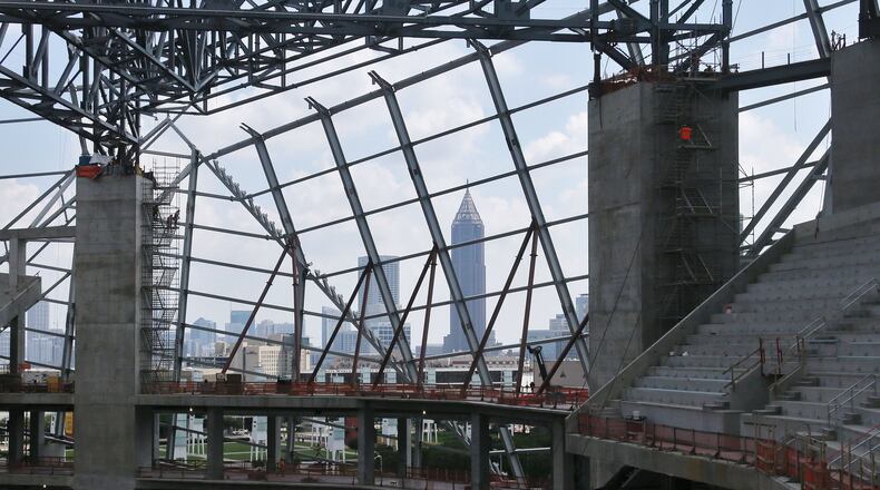 Mercedes-Benz Stadium, under construction in downtown Atlanta, is slated to open next year. (BOB ANDRES/BANDRES@AJC.COM)