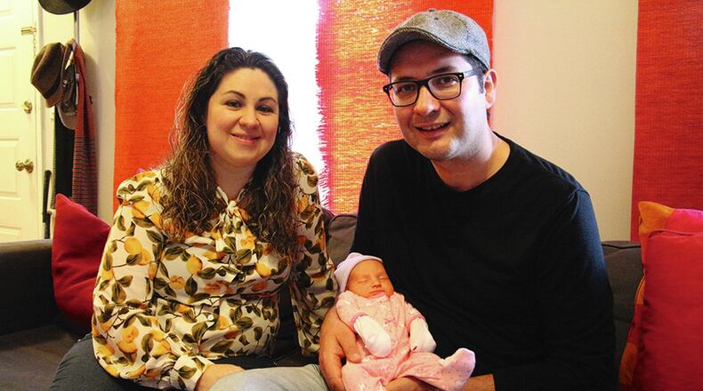 Anna Gaxiola-Leal and Jos Alberto Leal with their newborn baby Annabella. The couple waited seven years for the baby after two pregnancy loses. Johanes Rosell /MundoHispanico