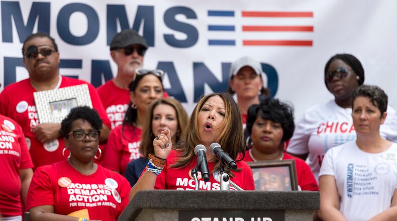 Lucy McBath, national spokesperson for Moms Demand Action for Gun Sense in America, speaks during a rally at Woodruff Park in Atlanta in 2017, during the NRA’s national convention in the city. DAVID BARNES / DAVID.BARNES@AJC.COM