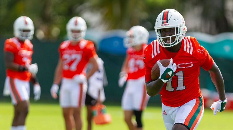 University of Miami wide receiver Marquez Ezzard (11) runs a drill during the first day of fall training camp at the Greentree Practice Fields in Coral Gables on Saturday, August 4, 2018.