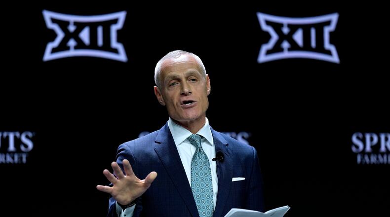 FILE - Big 12 Commissioner Brett Yormark addresses the media during the NCAA college Big 12 women's basketball media day, Oct. 22, 2024, in Kansas City, Mo. (AP Photo/Charlie Riedel, File)