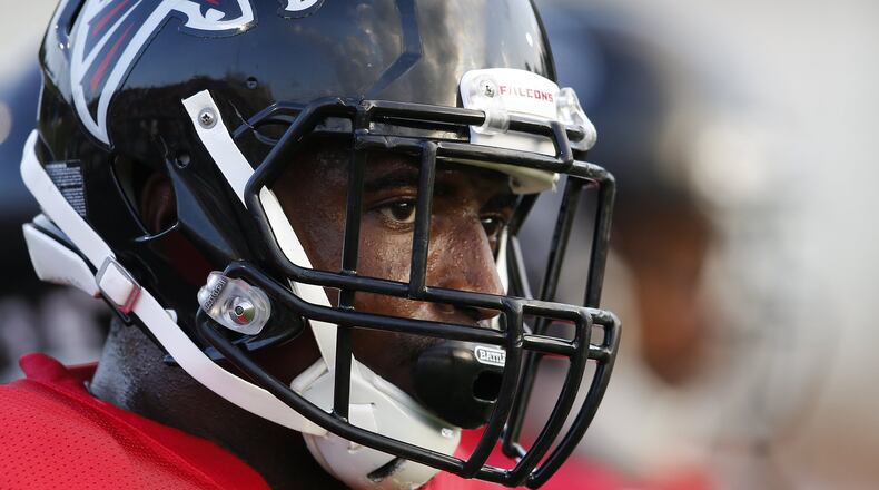 FILE - In this Aug. 5, 2016, file photo, Atlanta Falcons strong safety Keanu Neal (22) is shown during their annual Friday Night Lights NFL football practice at Grayson High School, in Loganville, Ga. Free-agent signee Dwight Freeney and rookie safety Keanu Neal are expected to make their preseason debuts for the Falcons on Thursday, Aug. 18, 2016, at Cleveland, bringing Atlanta’s defense closer to its projected regular-season status. (AP Photo/John Bazemore, File)