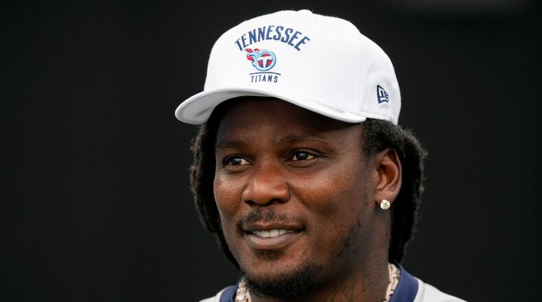 FILE - Former Tennessee Titans running back Chris Johnson visits the field during the second half of an NFL football game against the New York Jets, Sept. 15, 2024, in Nashville, Tenn. (AP Photo/George Walker IV, File)