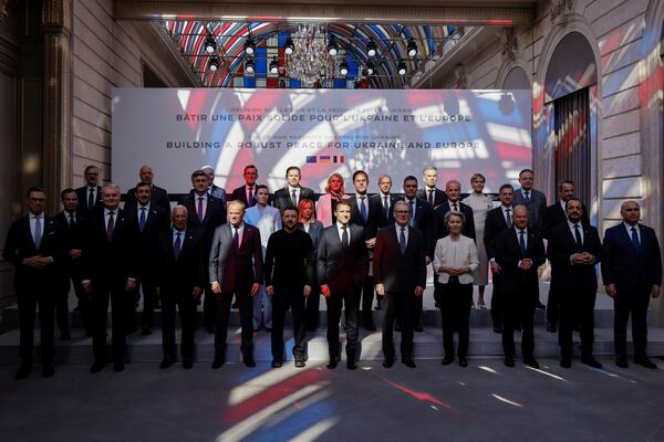 Officials pose as part of the so-called "Coalition of the willing" summit at the Elysee Palace, Thursday, March 27, 2025 in Paris. (Ludovic Marin, Pool via AP)