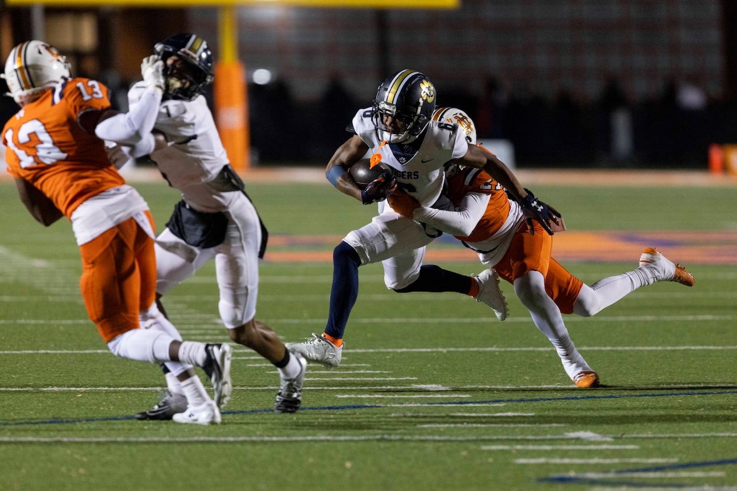 Douglas County’s Rah’keith Kelly (6) is tackled during a NCAA High School football game between North Cobb and Douglas County at North Cobb High School in Kennesaw, GA., on Friday, November 22, 2024. (Photo/Jenn Finch, AJC)