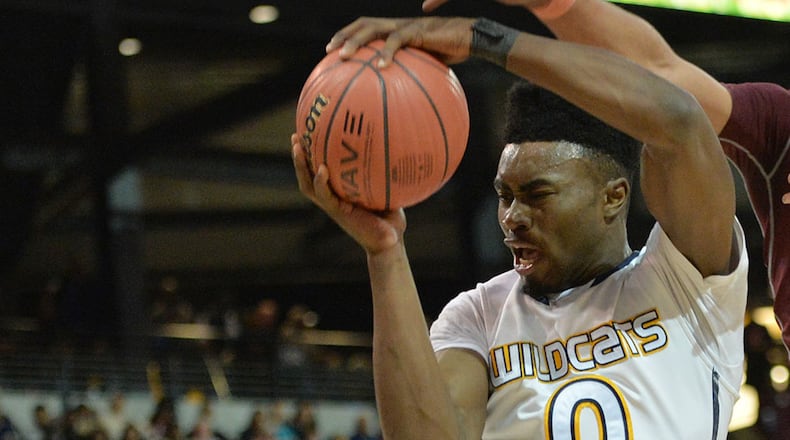 February 28, 2015 Atlanta - Wheeler's Jaylen Brown (0) catches a rebound as Tucker's Adonis Green (23) tries to steal in a basketball game at McCamish Pavilion in Georgia Tech campus on Saturday, February 28, 2015. HYOSUB SHIN / HSHIN@AJC.COM Jaylen Brown is the consensus No. 2 recruit in the nation. (Hyosub Shin / AJC)