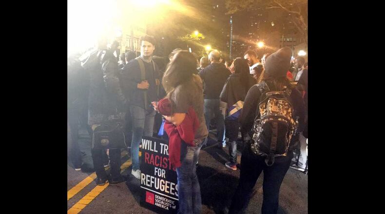 Anti-Trump protesters gather at Piedmont Park. (Credit: Channel 2 Action News)