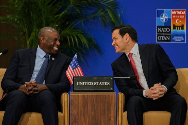 United States Secretary of State Marco Rubio, right, talks to British Foreign Secretary David Lammy during an informal meeting of NATO's foreign ministers in Antalya, southern Turkey, Thursday, May 15, 2025. (AP Photo/Khalil Hamra)