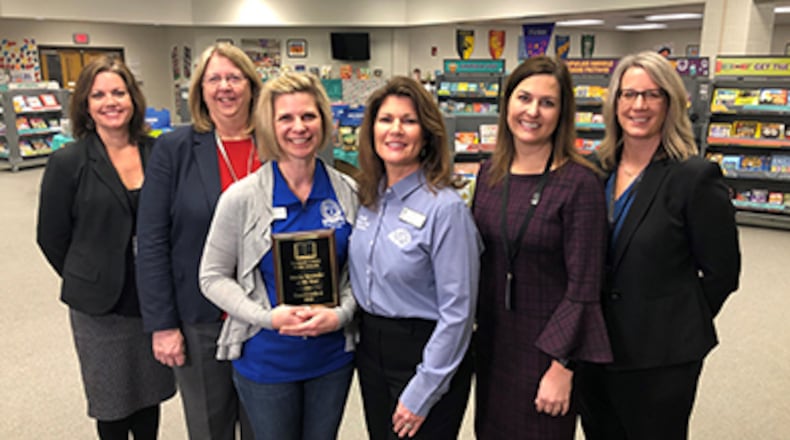 Gwinnett County Public Schools recently named Traci Costilow of Burnette Elementary its Media Specialist of the Year. Pictured L-R: Karen Willingham (Media Services), Mary Barbee (Director of Media Services), Traci Costilow, Kim Reed (Burnette ES Principal), Julie Richardson (Media Services), Jan Wilson (Media Instruction). COURTESY GWINNETT COUNTY PUBLIC SCHOOLS