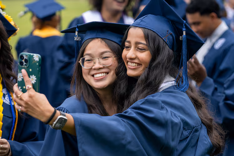 Sophia Newell and Harvy Patel take a selfie before the commencement ceremony at Berry College on Saturday May 9, 2026. (Daniel Whiting/Berry College)
