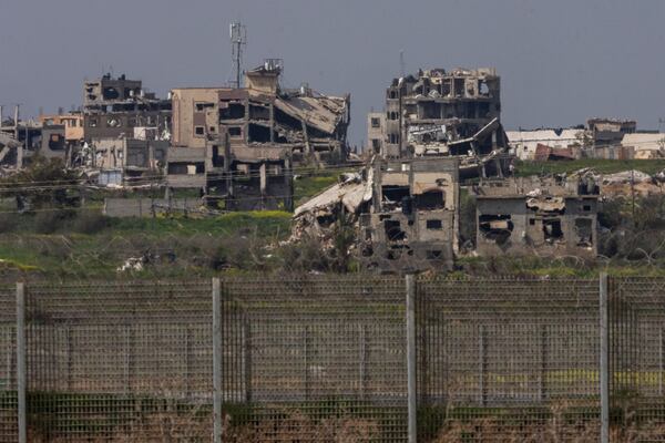 Destroyed buildings by Israeli bombardments in the northern Gaza Strip as seen from southern Israel, Wednesday, March 5, 2025. (AP Photo/Ariel Schalit)