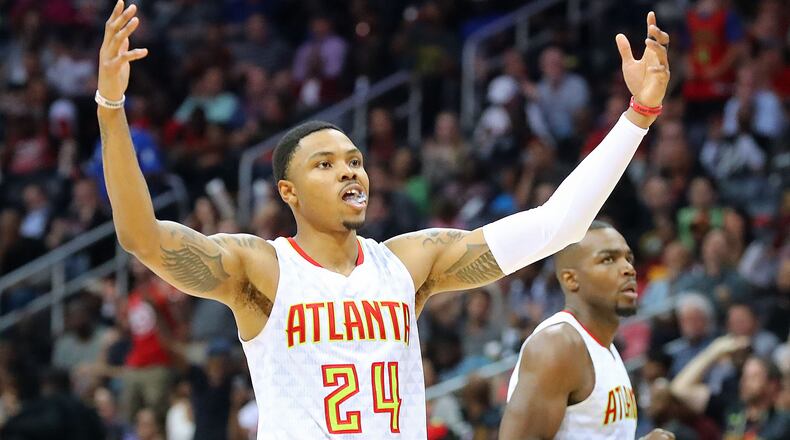 April 24, 2017, Atlanta: Atlanta Hawks Kent Bazemore and Paul Millsap look to the crowd to celebrate during a 111-101 victory over the Washington Wizards in game 4 of a first-round NBA basketball playoff series on Monday, April 24, 2017, in Atlanta. Curtis Compton/ccompton@ajc.com