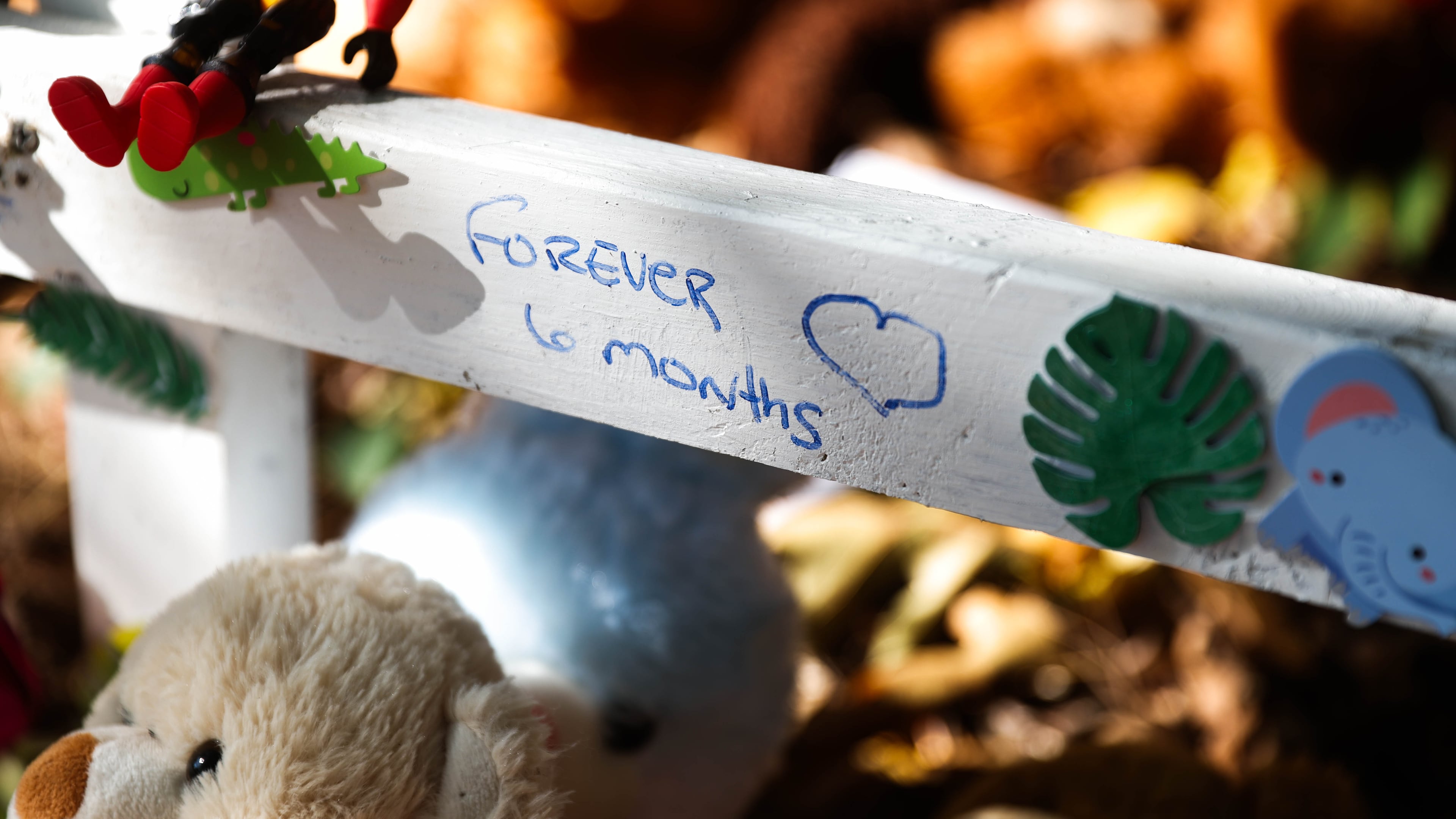 Sun shines on a memorial for 6-month-old Nnakai Pratt on Friday. (Abbey Cutrer/AJC)