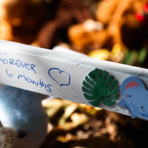 Sun shines on a memorial for 6-month-old Nnakai Pratt on Friday. (Abbey Cutrer/AJC)